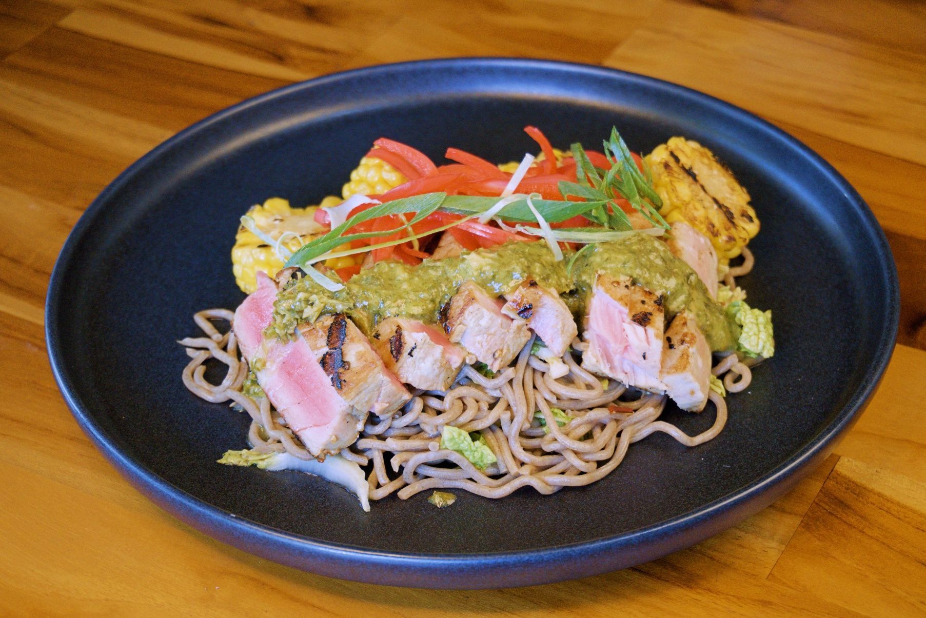 Plate of Soba Noodles, Seared Tuna, Grilled Corn, With Green Sauce and Garnishes — Chop 'n Chill in Port Macquarie, NSW