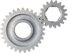 Two interlocking metal gears.  | Kensington Motor Cars