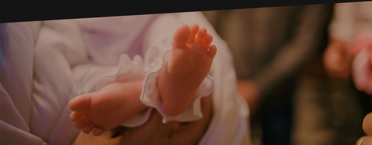 christening newborn in church