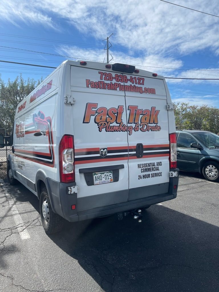 Fast Trak service van parked near at a customer's home for a Faucet Replacement service