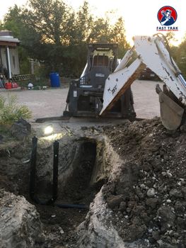 Image of Colorado plumbers repairing a sewer line, ensuring minimal disruption