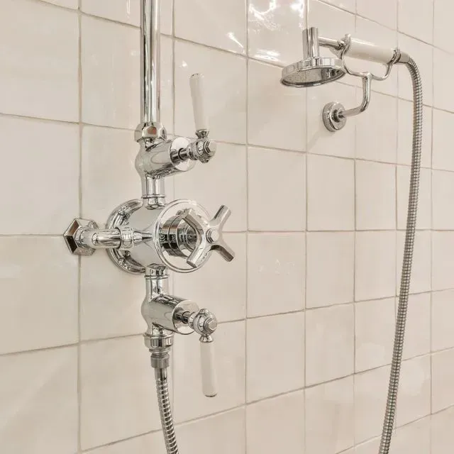 image of a shower valve in a bathroom