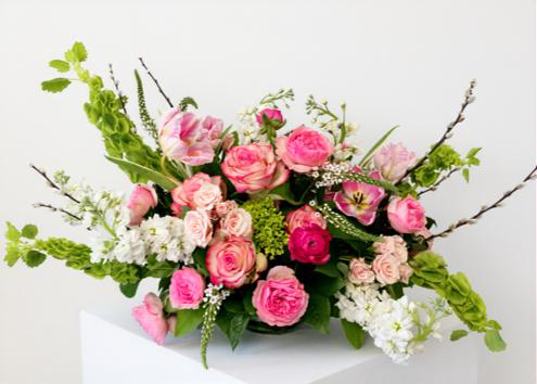 Fresh bouquet of deluxe garden flowers with natural foliage, created especially for you.
