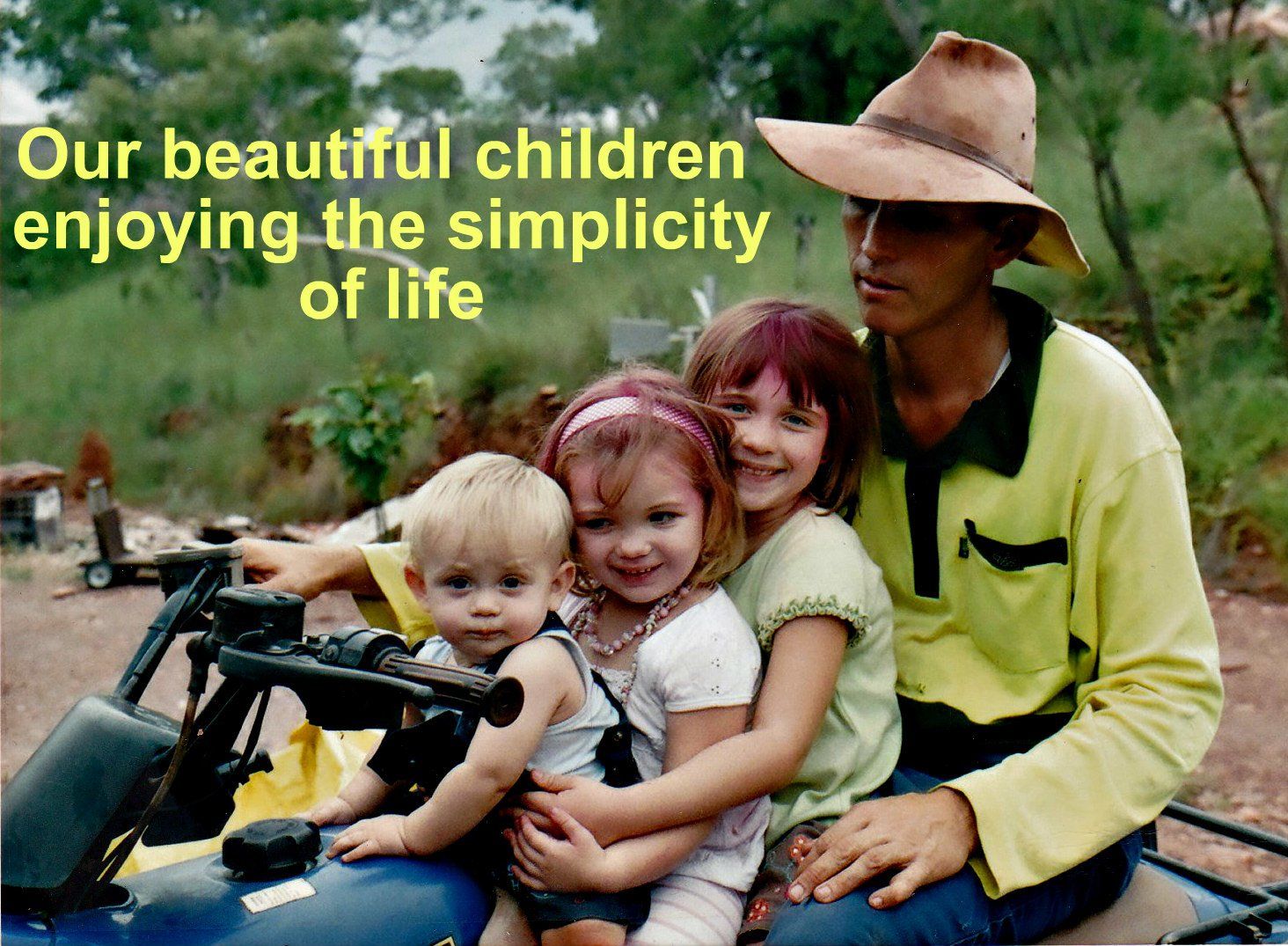 kids and man on motorbike
