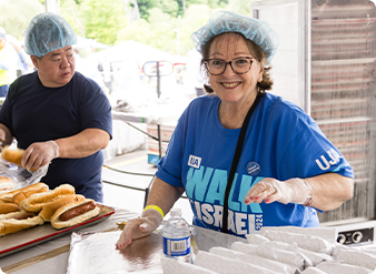 Volunteers serving food