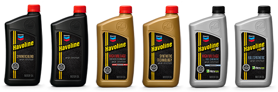 Six bottles of Havoline motor oil with varying colors of black, gold, and silver, each with a colored cap.