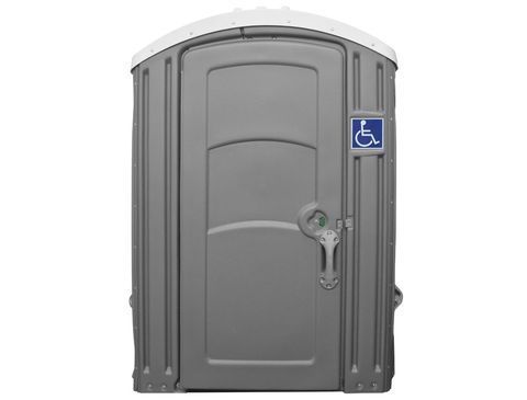 A portable toilet with a handicap sign on the door.