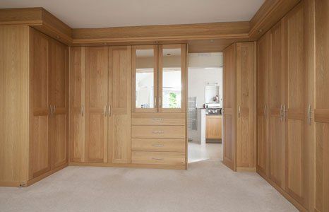 Supplying and fitting mirrored wardrobes