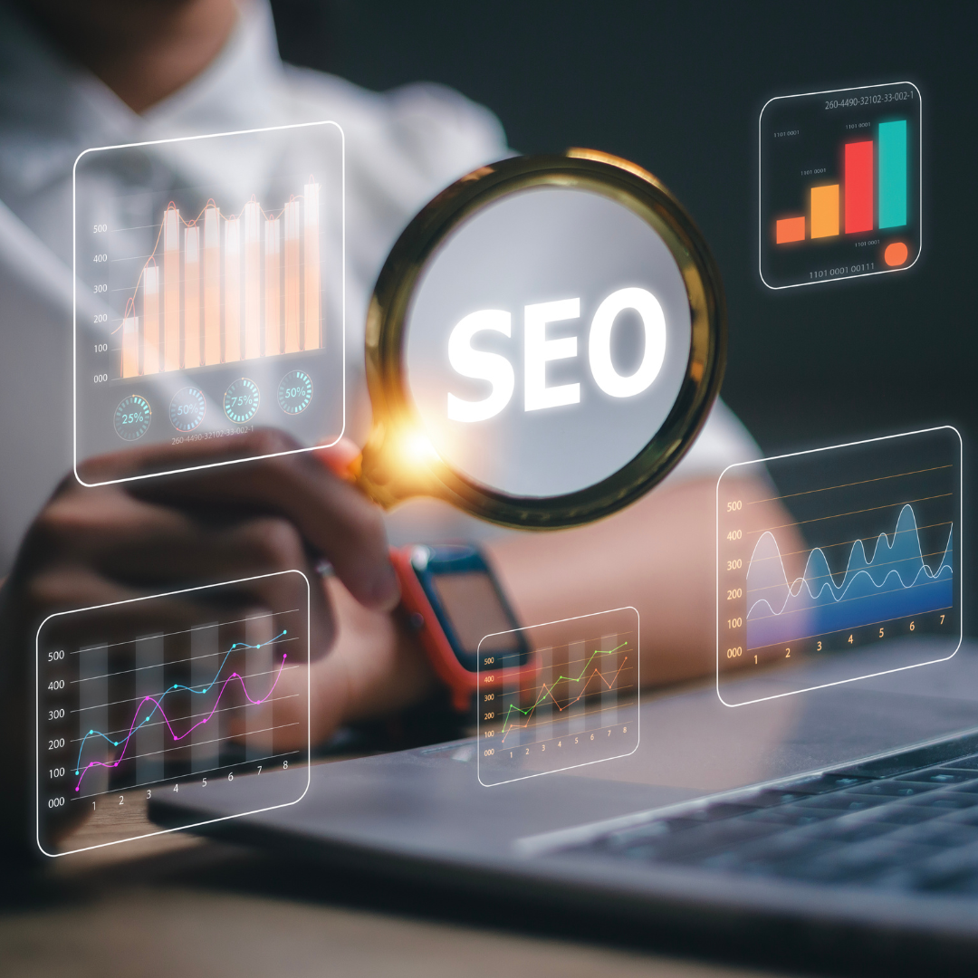 A person is holding a magnifying glass with the word seo on it.