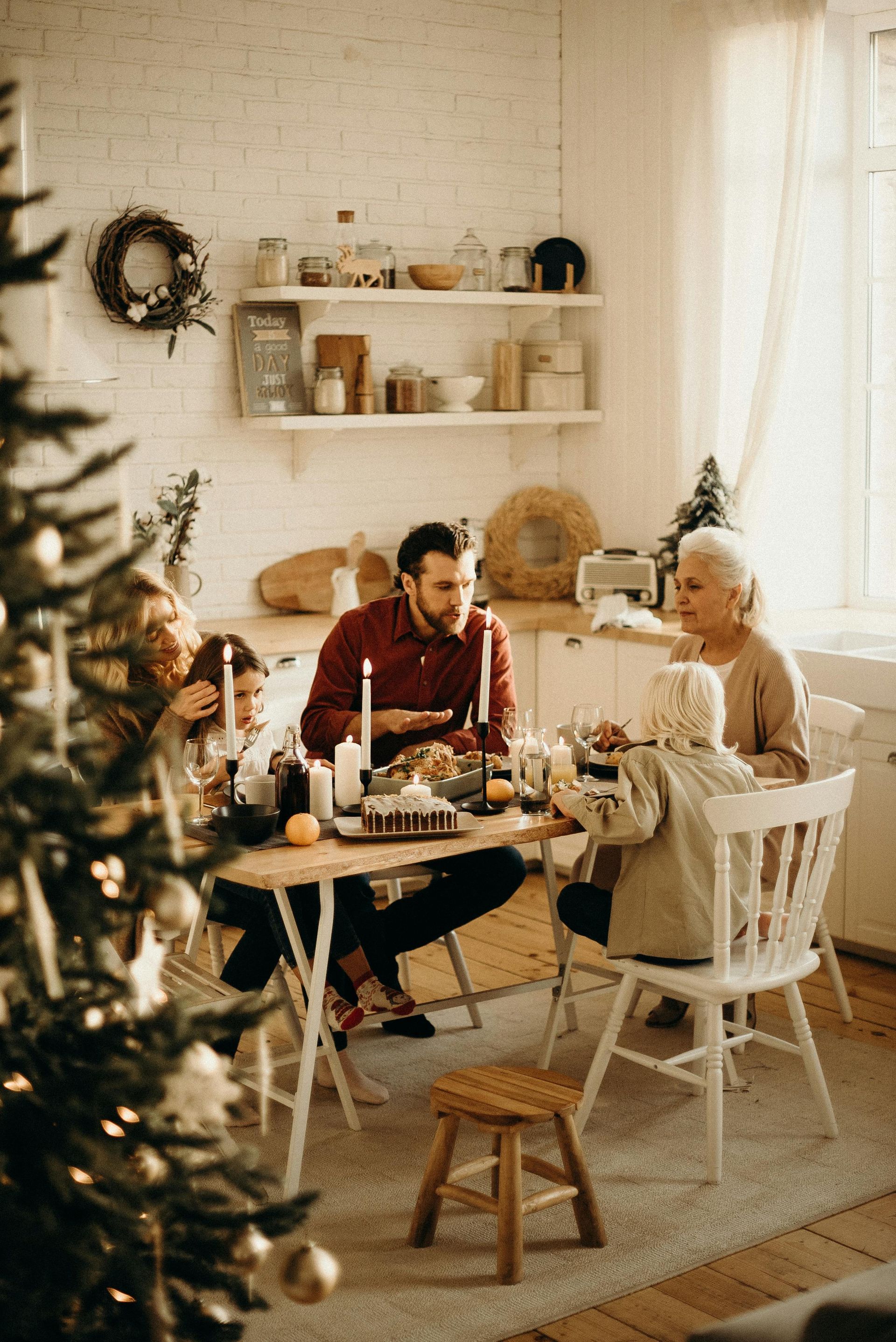 Family sharing dinner during the holidays while reflecting on estate planning
