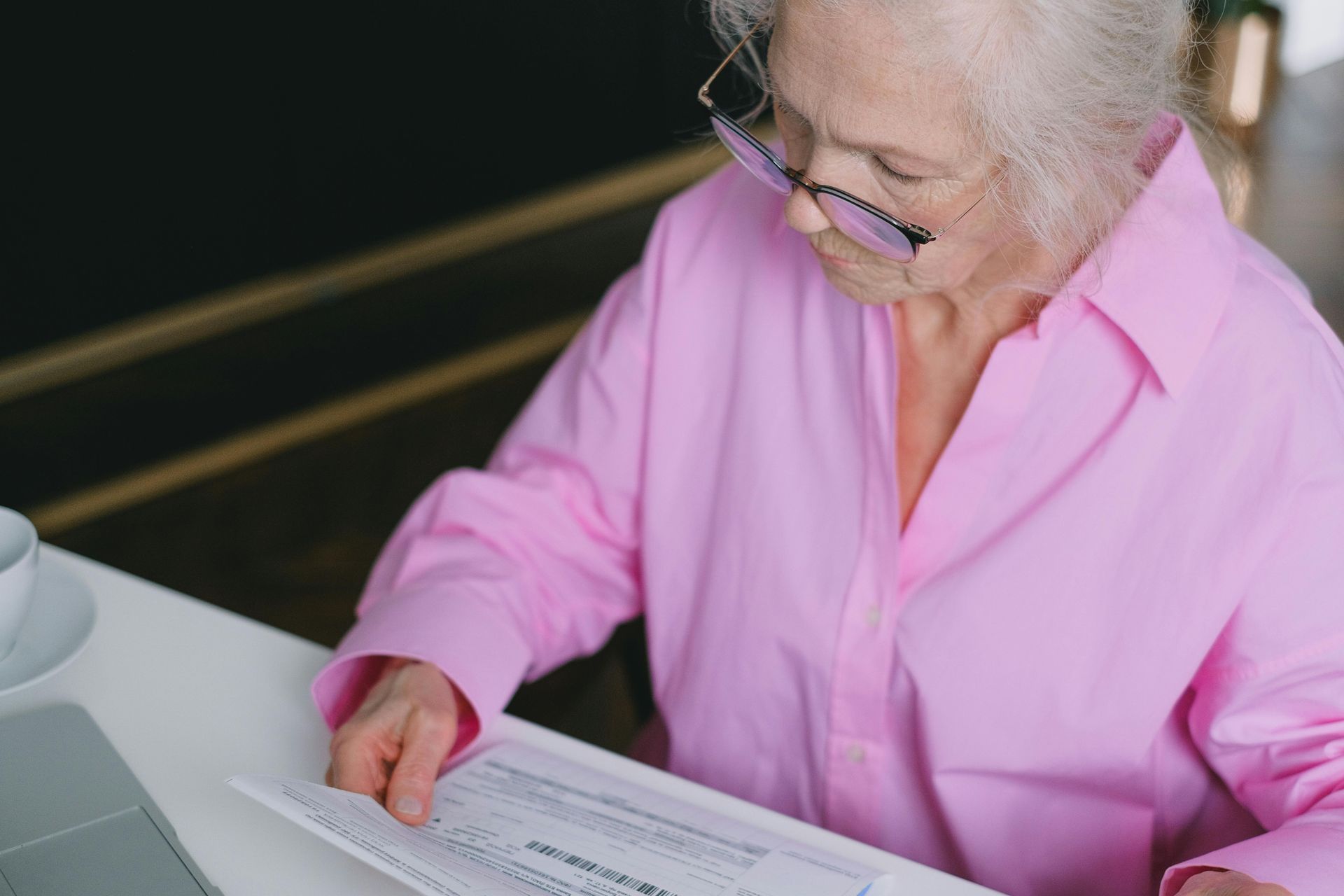 Woman reviewing her estate planning documents with her estate planning attorney in San Diego.