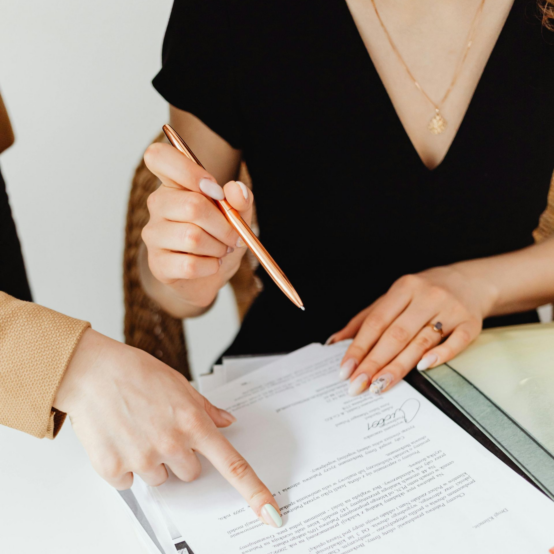 Client reviewing a trust with a San Diego estate planning attorney during a legal planning meeting