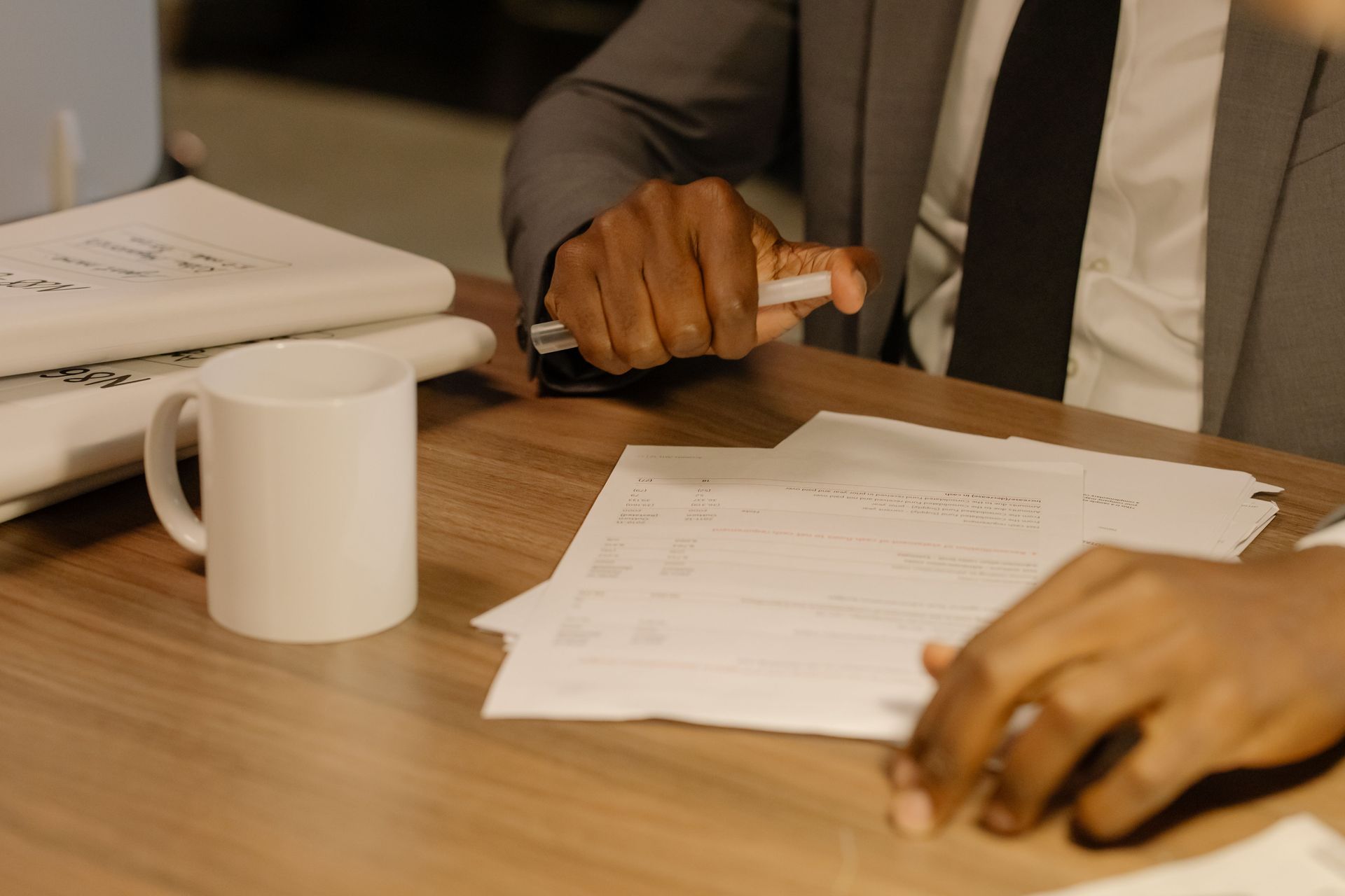 California business owner reviewing trust documents to protect LLC from probate.