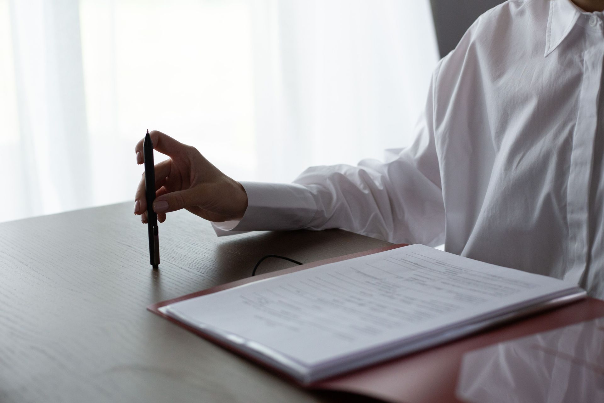 San Diego estate planning attorney reviewing living trust documents with client