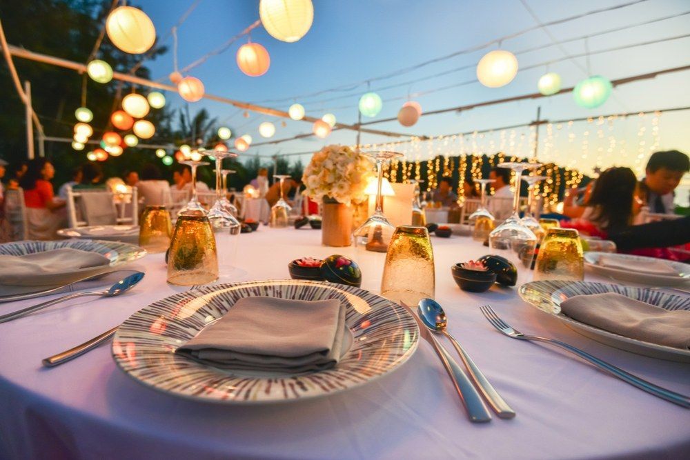 A Table Set for a Wedding Reception With Plates, Glasses, and Silverware — Kowin Restaurant in Wingham, NSW