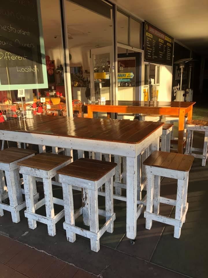 A Restaurant With Tables and Stools in Front of a Window — Kowin Restaurant in Taree, NSW
