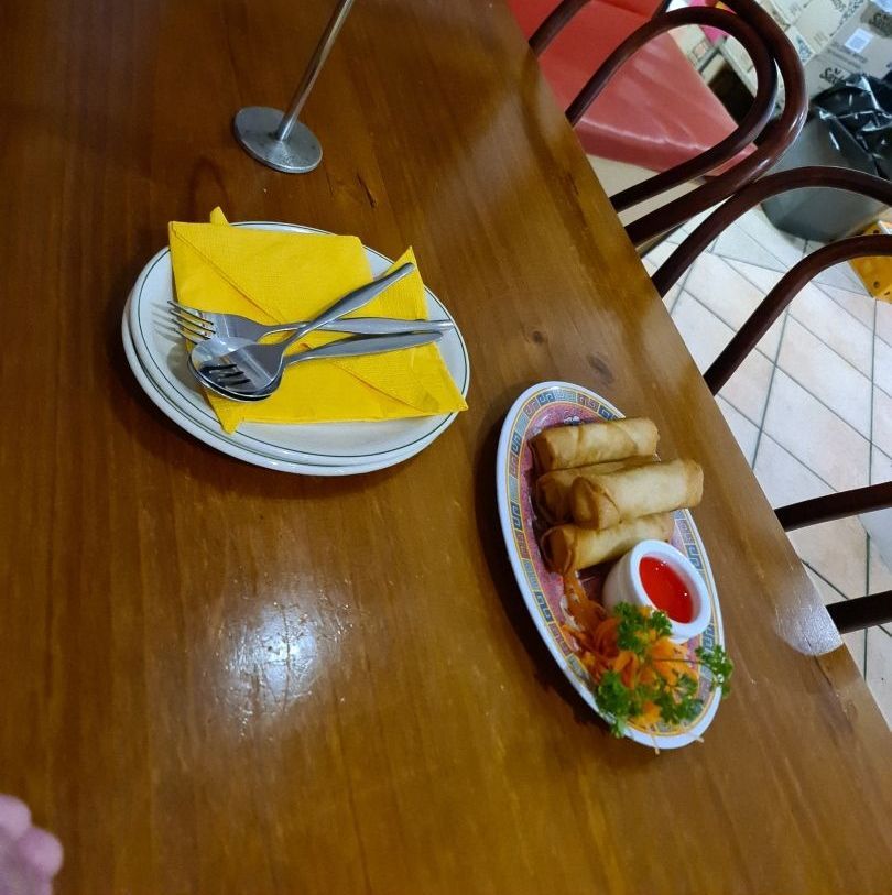 A Table With a Plate of Food — Kowin Restaurant in Taree, NSW