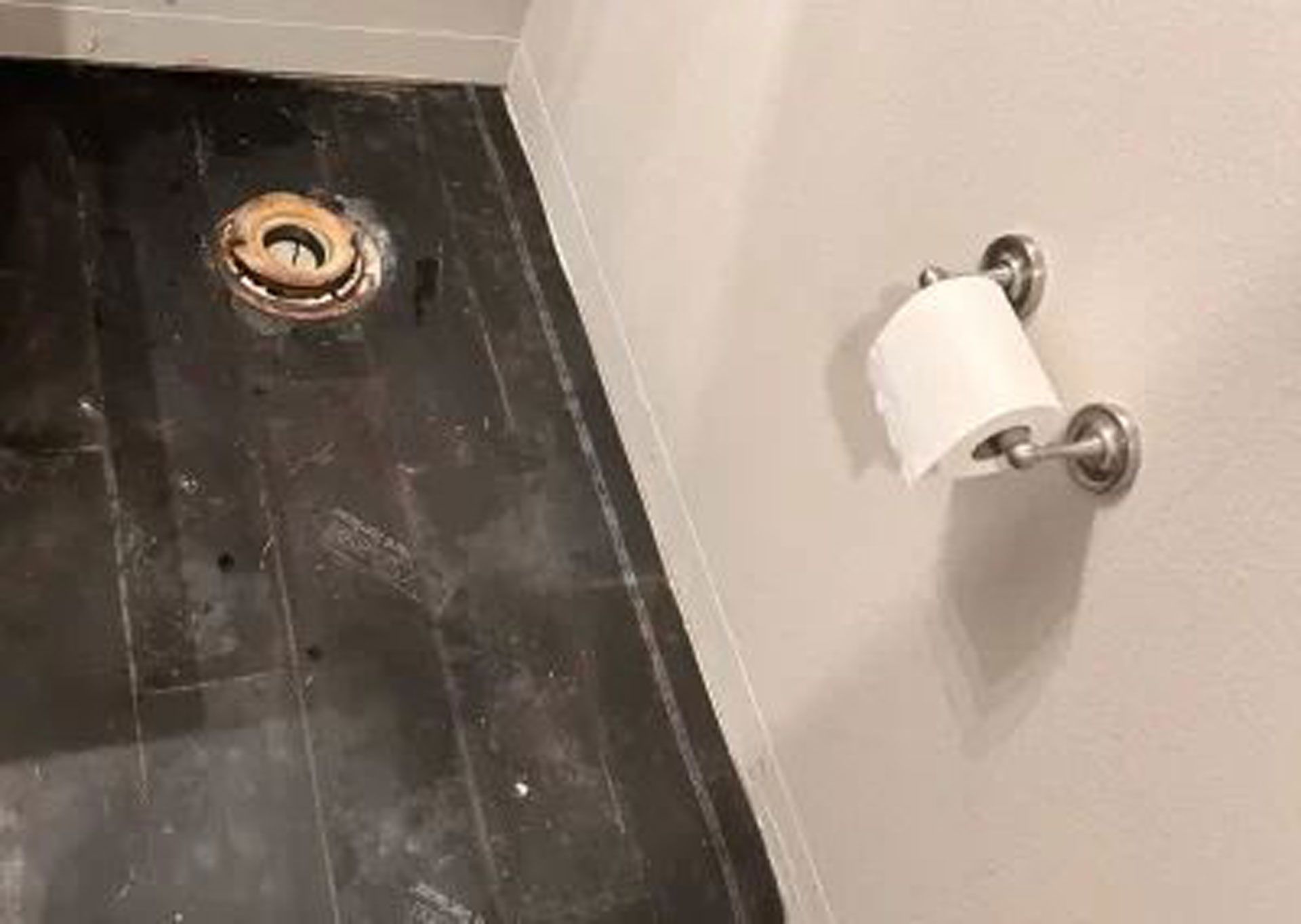 A roll of toilet paper in a bathroom
