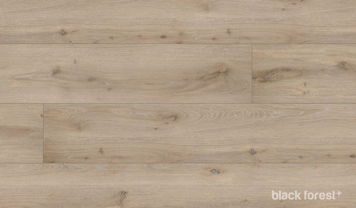 A close up of a wooden floor with the word black forest on it.