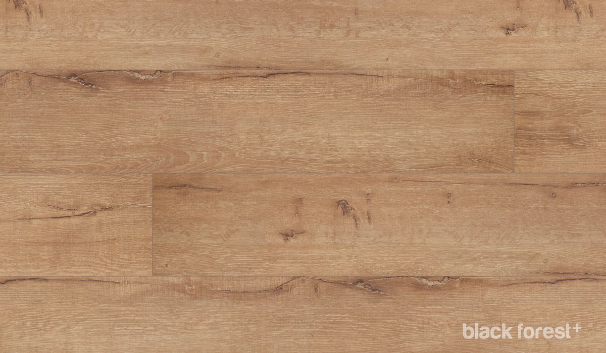 A close up of a wooden floor with the words `` black forest '' written on it.