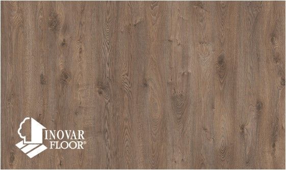 A close up of a wooden floor with the word inovar floor on it.