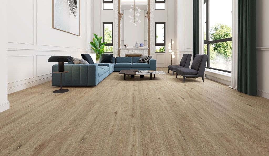 A living room with hardwood floors and a blue couch.