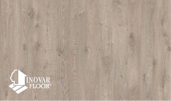 A close up of a wooden floor with the word inovar floor on it.