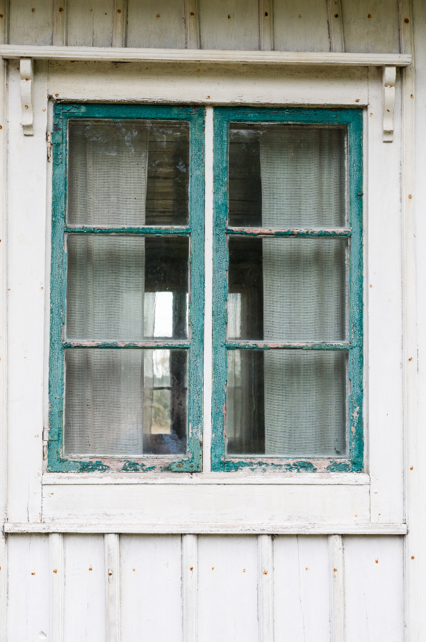 Window with peeling paint.