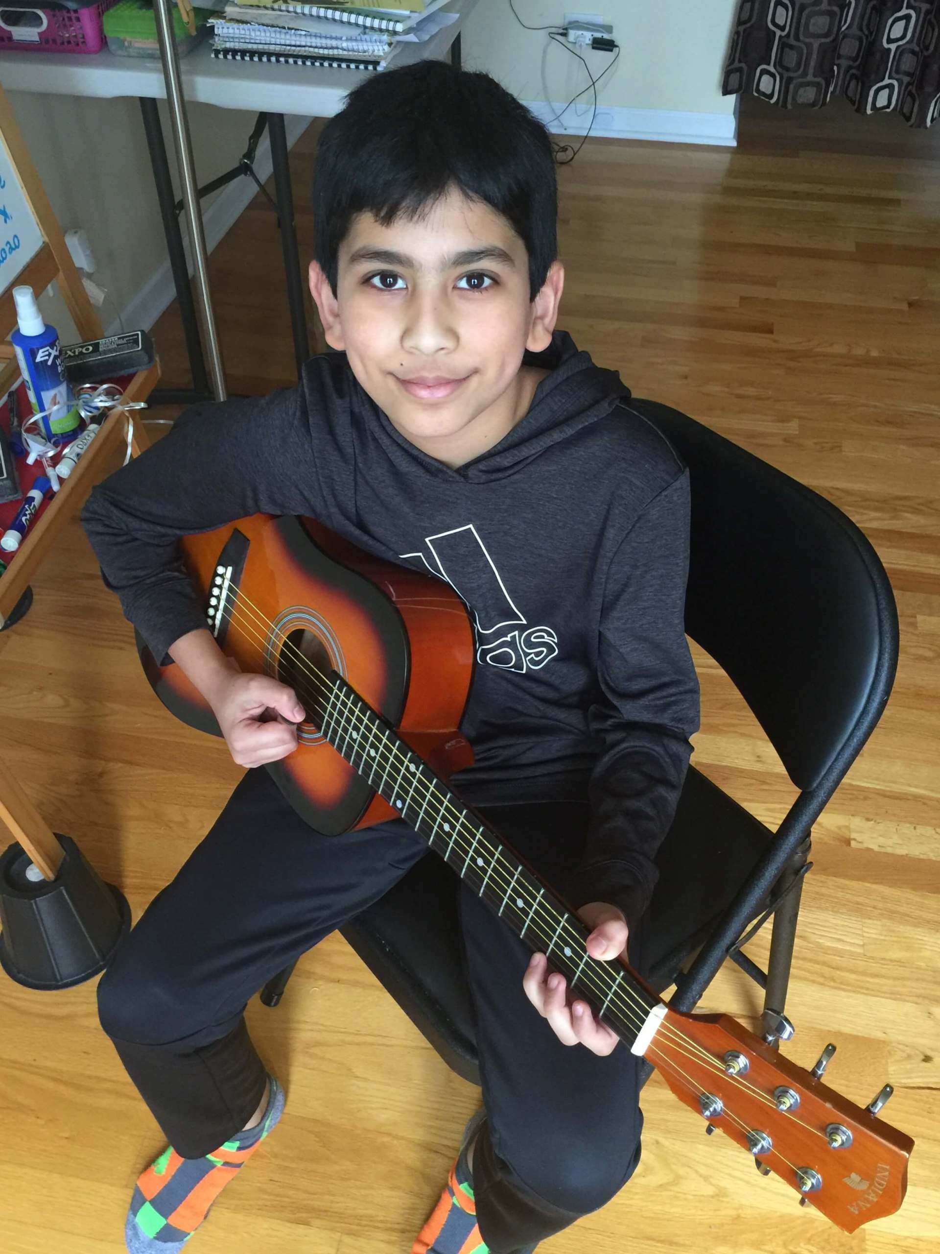 Small Guitar Played by Kid — A Plus In Home Guitar Lessons — Arlighton Heights, IL