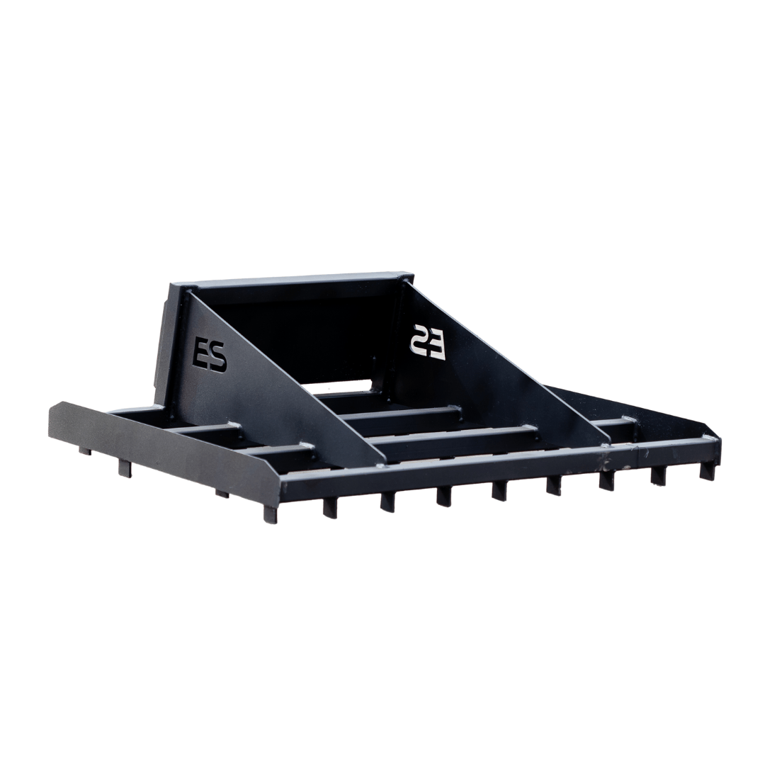 A black metal object with a white background and a few holes in it.