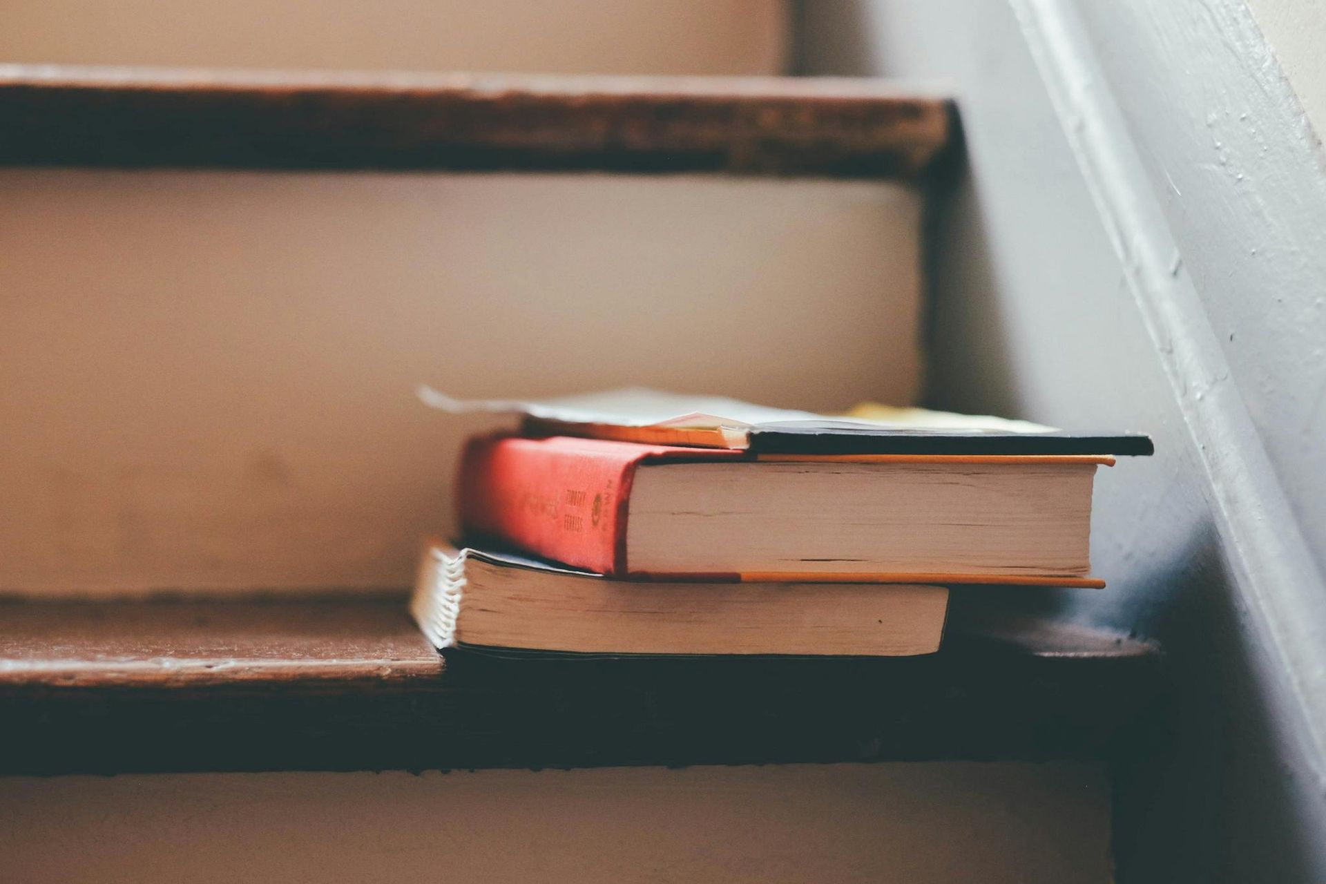 clutter on stairs, books on stairs