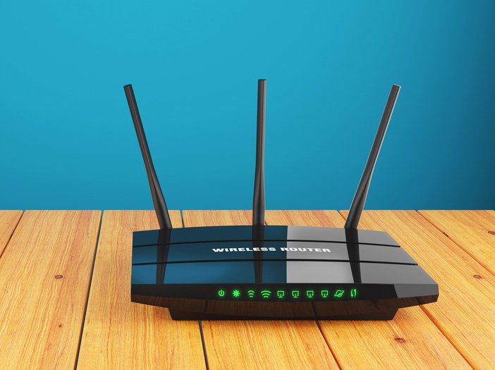 Wireless Router On Wooden Table — Antenna Installation In Grafton NSW