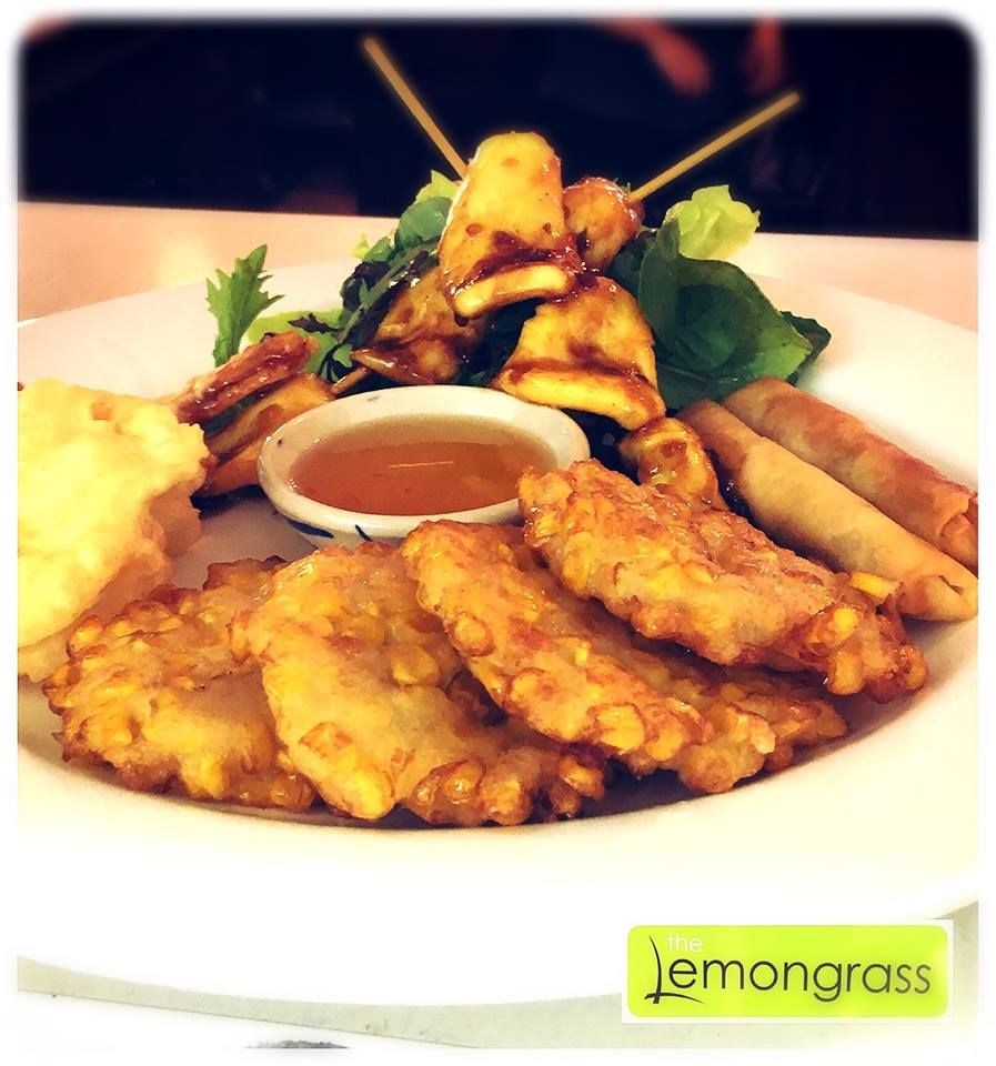 A plate of food with a lemongrass logo in the corner