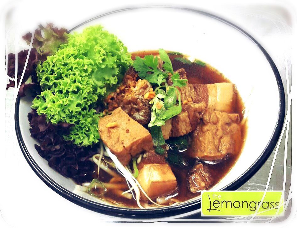 A bowl of food with a lemongrass logo on it