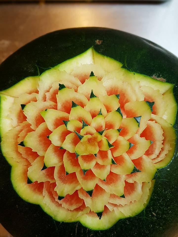 A watermelon has been carved into a flower shape