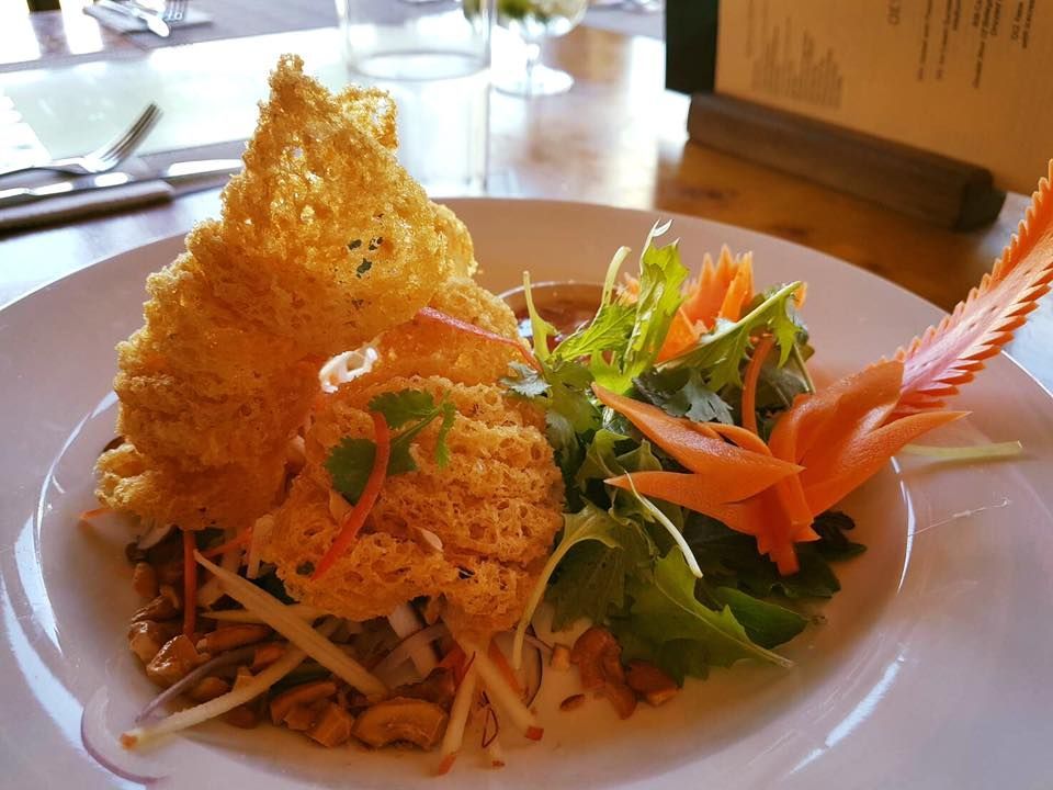 A close up of a plate of food on a table