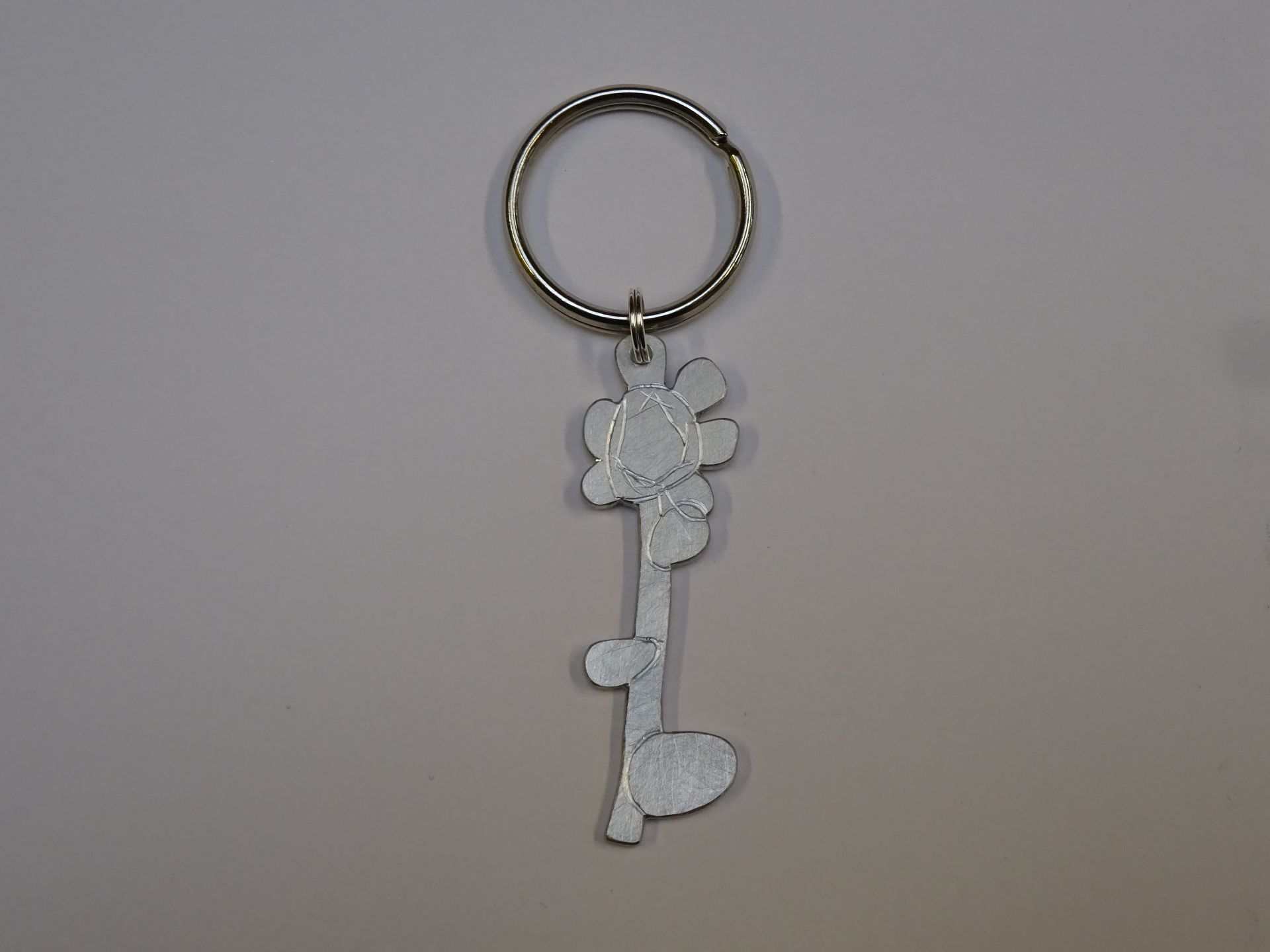 Kindertekening omgezet naar sleutelhanger.