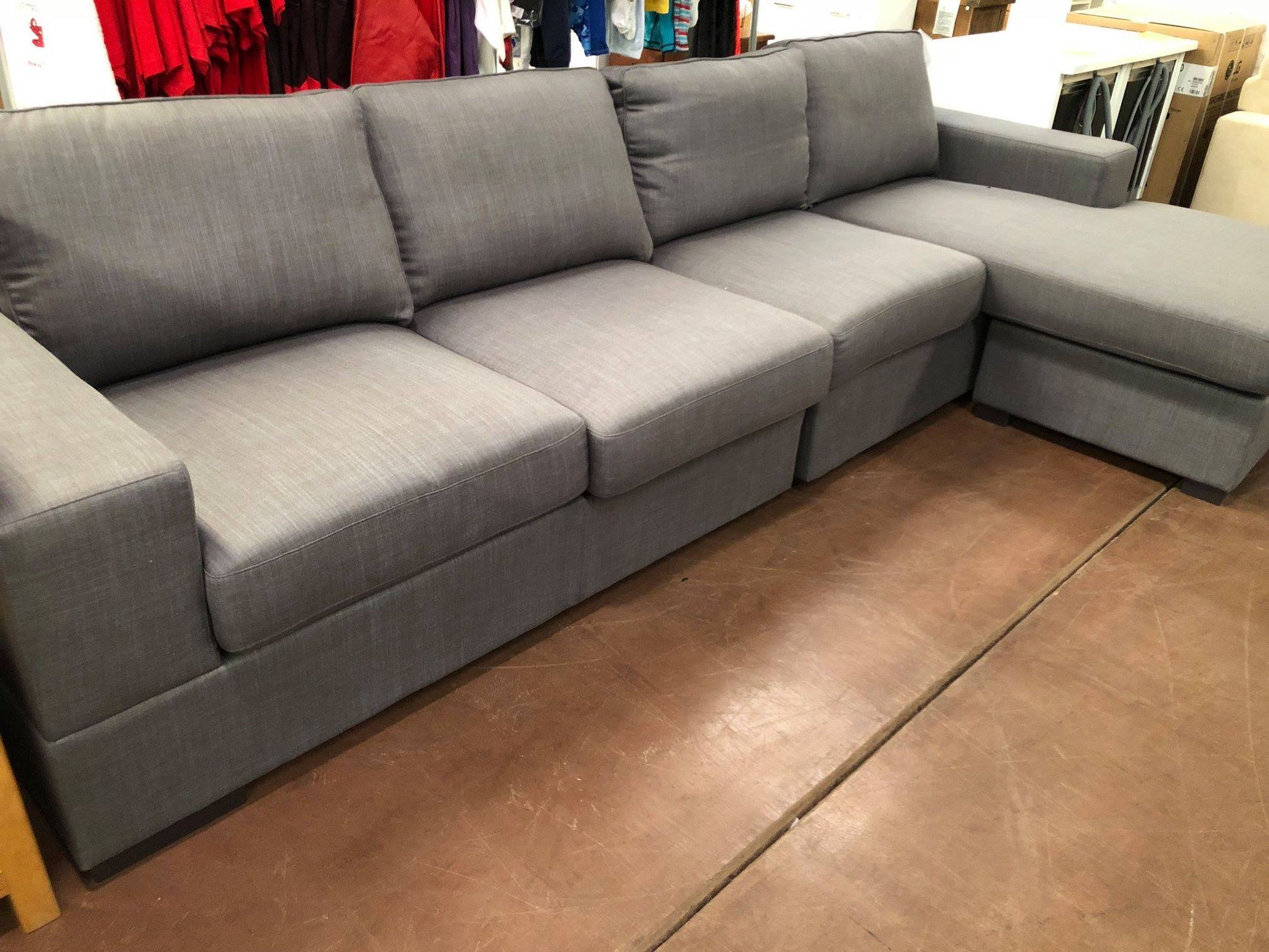 Grey Sectional Sofa in a Store, With a Chaise Lounge on the Right — Enterprise Electrics NT Pty Ltd in Tennant Creek, NT