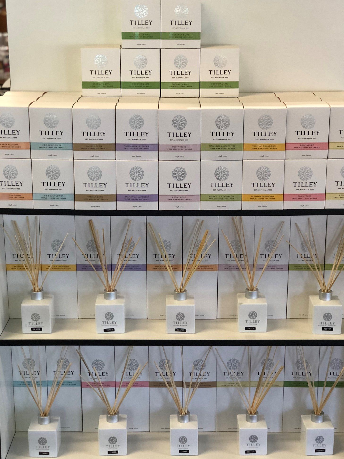 Display of White Reed Diffusers and Boxes of Various Scents on Shelves — Enterprise Electrics NT Pty Ltd in Tennant Creek, NT