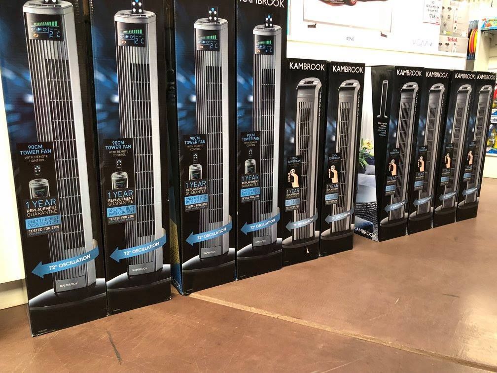 Tower Fans in Boxes, Displayed on a Store Shelf — Enterprise Electrics NT Pty Ltd in Tennant Creek, NT