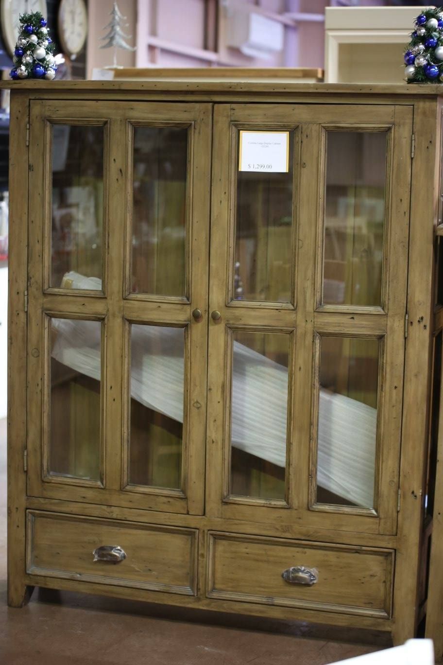 Wooden Cabinet With Glass Doors and Drawers, Indoors — Enterprise Electrics NT Pty Ltd in Tennant Creek, NT
