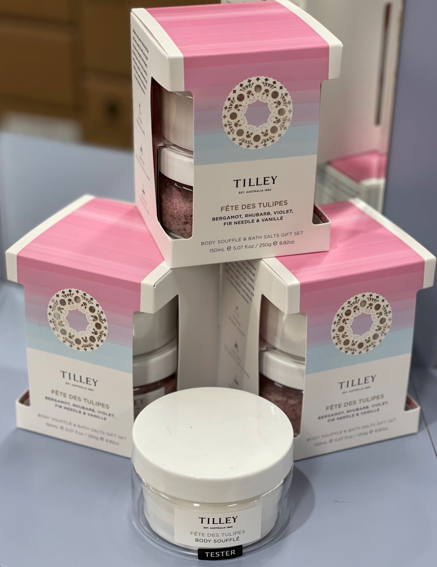 Pink and white Tilley skincare product boxes stacked, with one jar in front — Enterprise Electrics NT Pty Ltd in Tennant Creek, NT