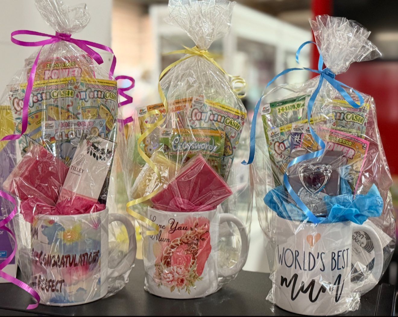 Three Gift Baskets With Mugs and Treats — Enterprise Electrics NT Pty Ltd in Tennant Creek, NT
