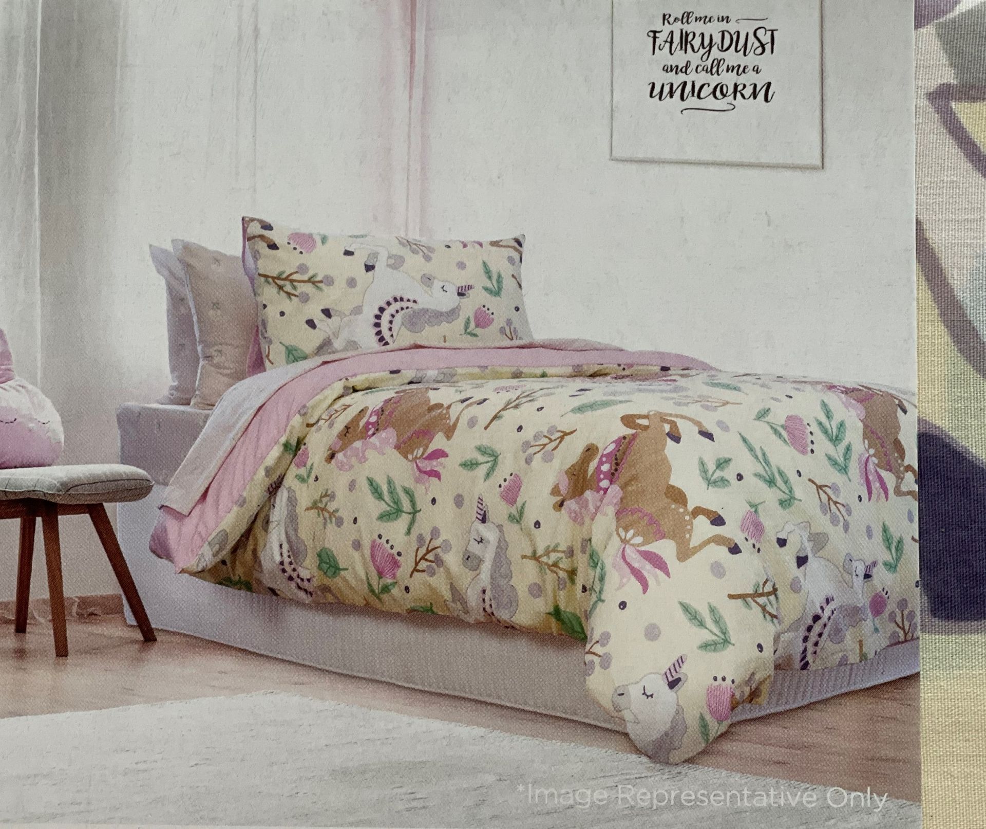 Bed With a Unicorn-themed Comforter and Pillow in a Light-coloured Room — Enterprise Electrics NT Pty Ltd in Tennant Creek, NT
