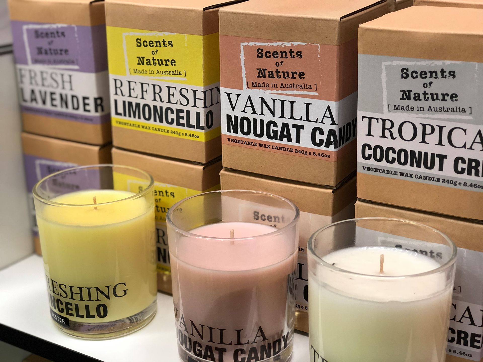 Candles in Glass Jars With Boxes Behind Them — Enterprise Electrics NT Pty Ltd in Tennant Creek, NT
