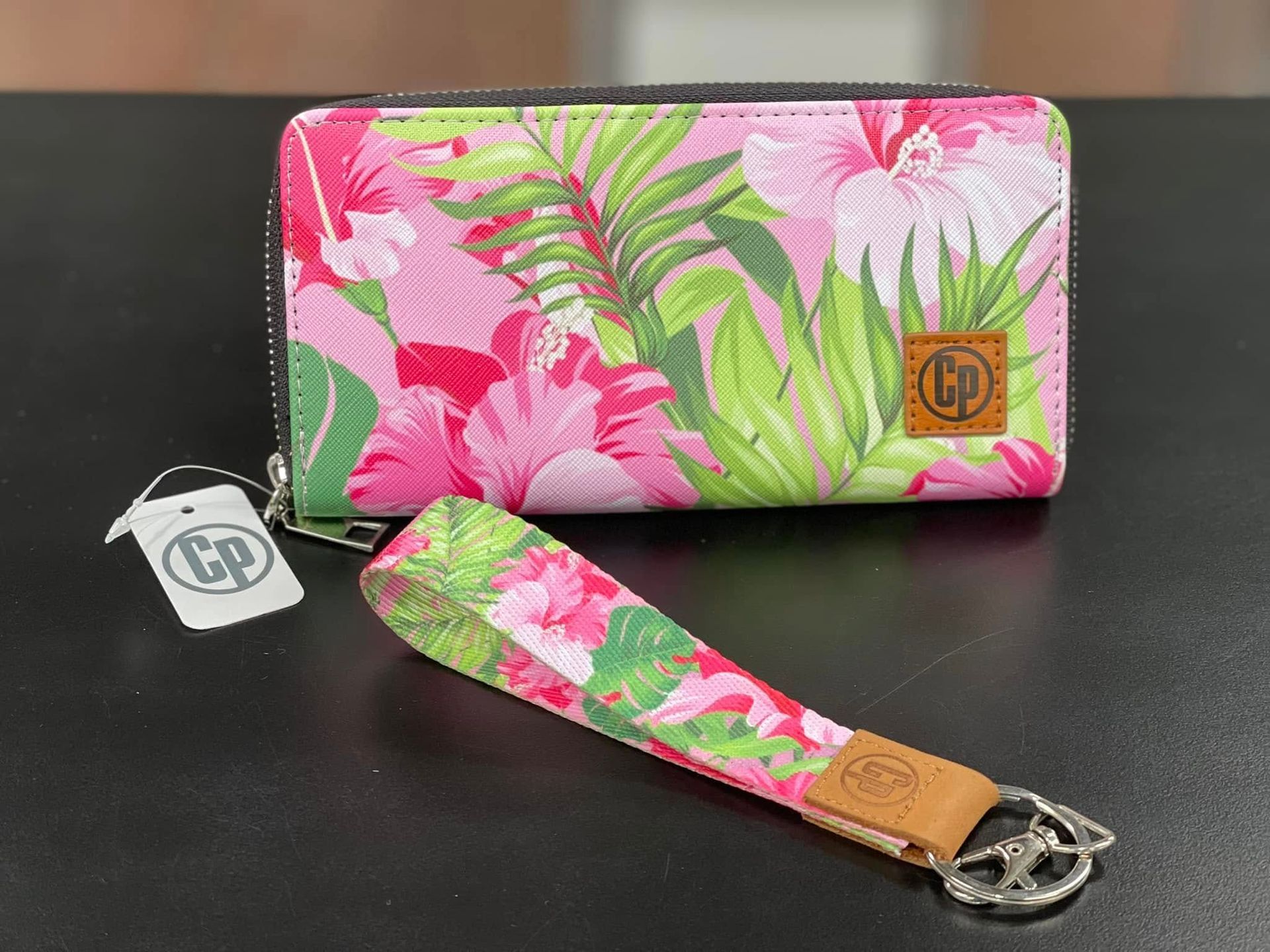 Pink Floral Wallet and Matching Wristlet, on a Black Surface — Enterprise Electrics NT Pty Ltd in Tennant Creek, NT
