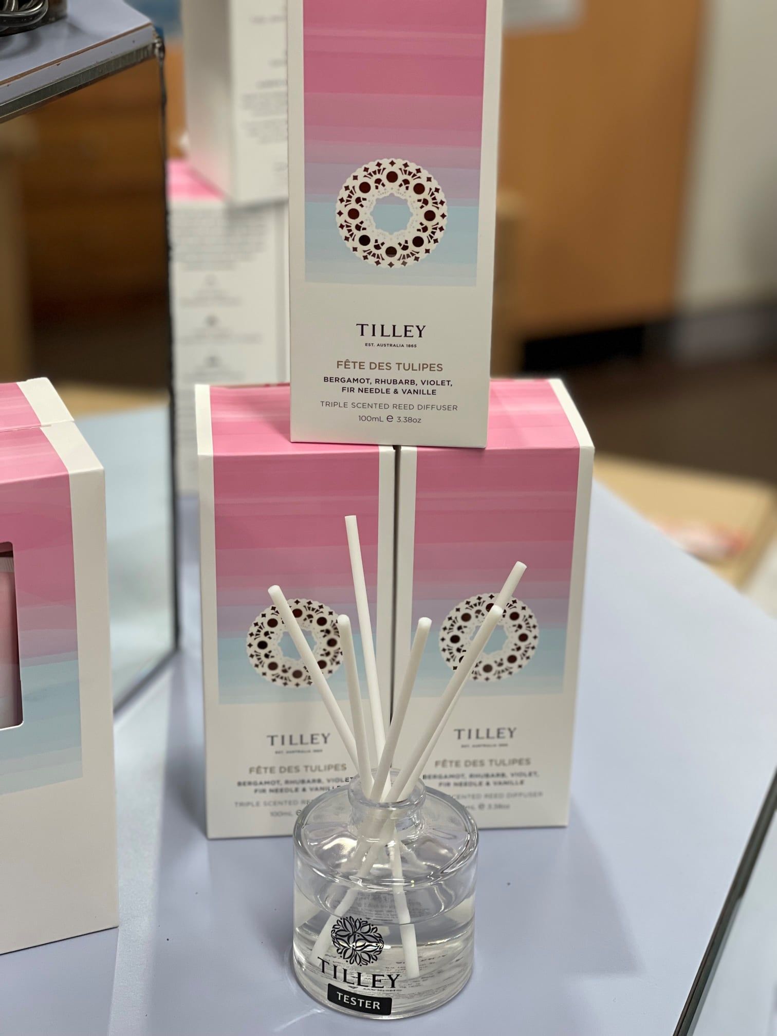 Diffuser With White Reeds, Clear Glass Bottle, and Pink and Blue Boxes — Enterprise Electrics NT Pty Ltd in Tennant Creek, NT
