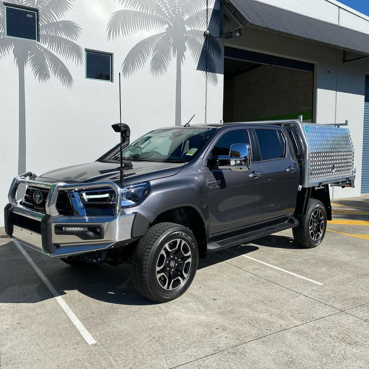 Gray Toyota Pickup Truck With Modifications Parked Outdoors — All Coast Auto Solutions in Noosaville, QLD