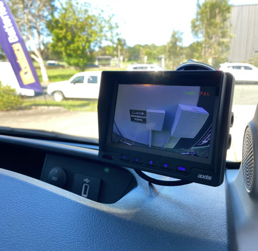 A Dashboard With a Screen Displaying a Rear Camera View — All Coast Auto Solutions in Noosaville, QLD
