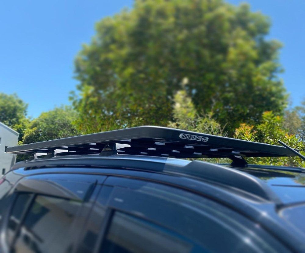 Black Roof Rack Mounted on a Dark-coloured SUV — All Coast Auto Solutions in Noosaville, QLD